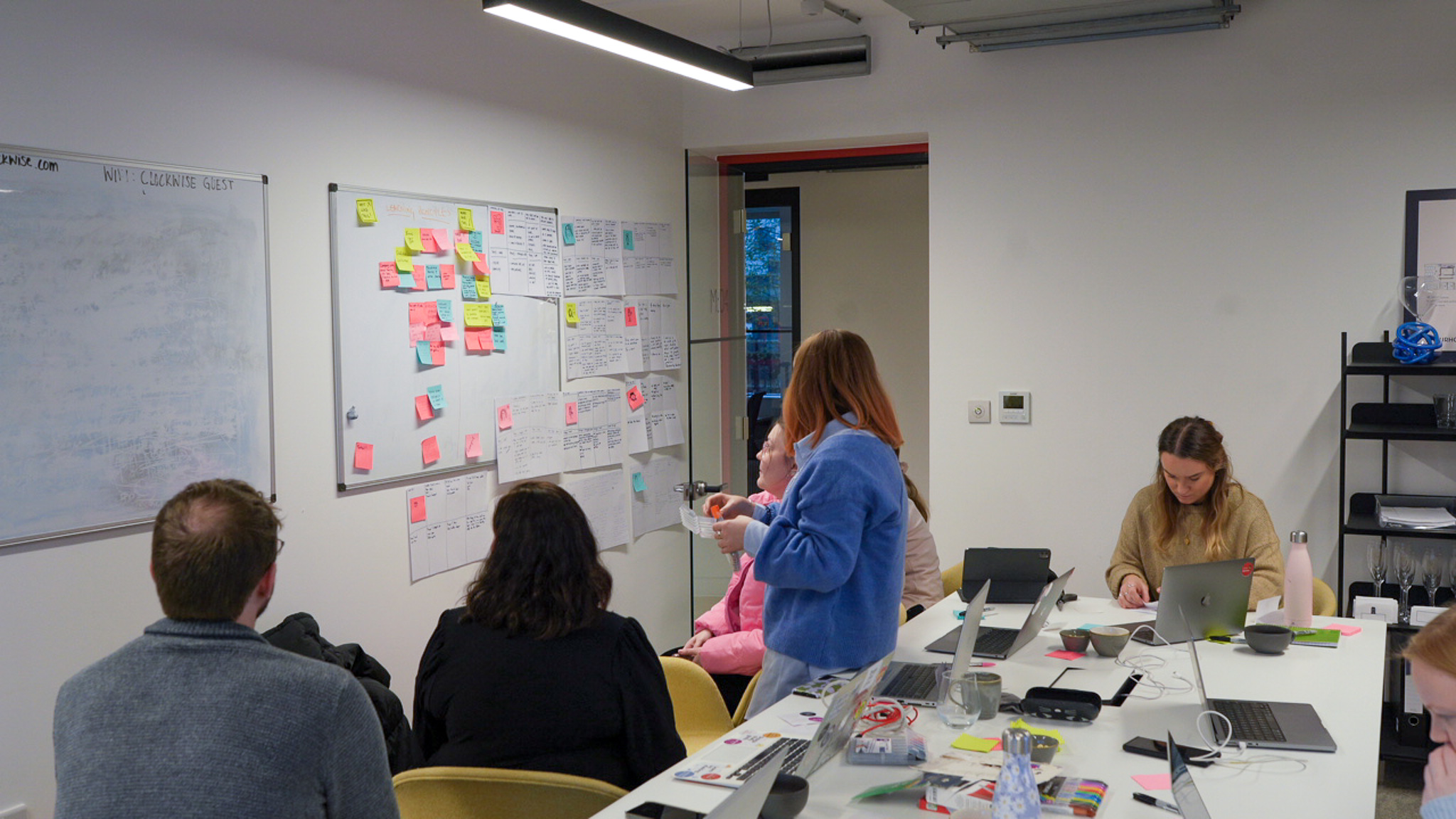 A photo of the team designing content for the website